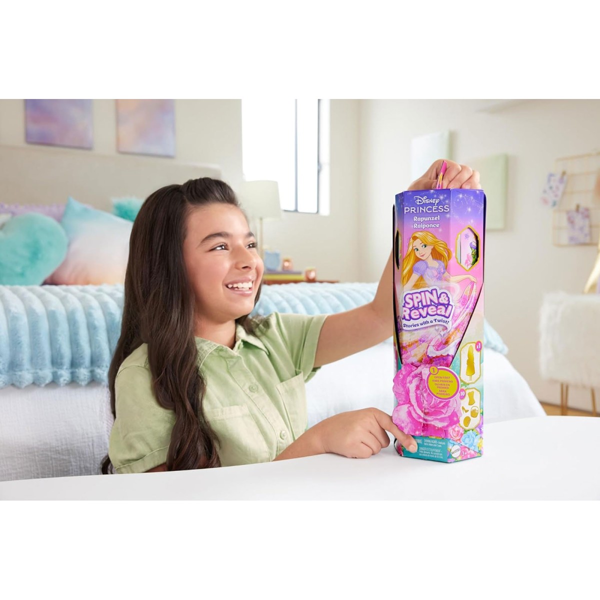 Mattel HTV86 - Disney Princess - Spin & Reveal - Rapunzel Puppe mit 11 Überraschungen, darunter 5 Accessoires, 5 Sticker